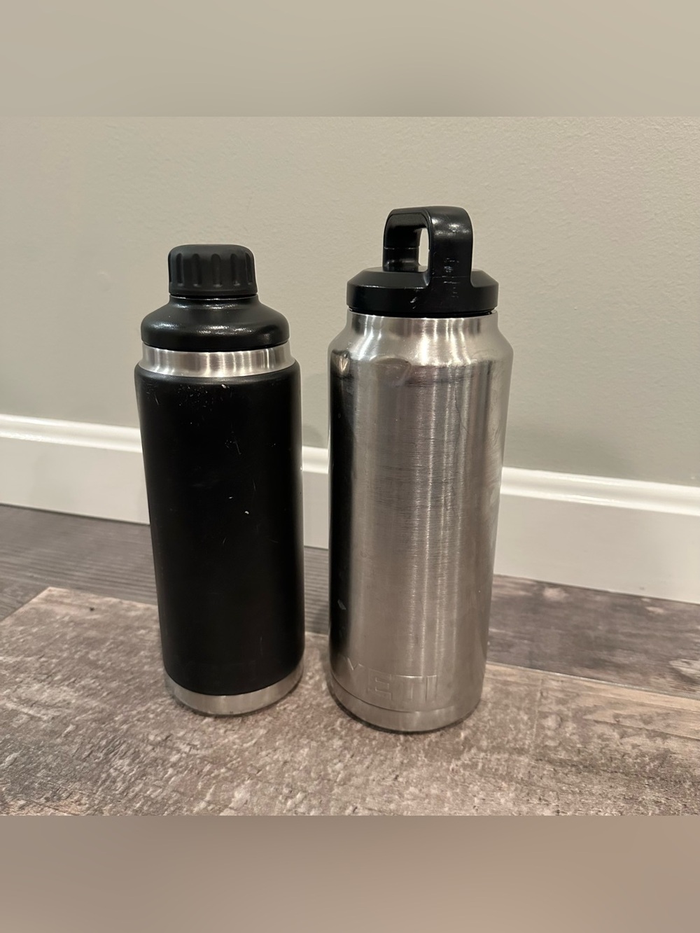 2 Yeti Rambler Bottles 36 oz Silver and 28 oz Black insulated & leak proof